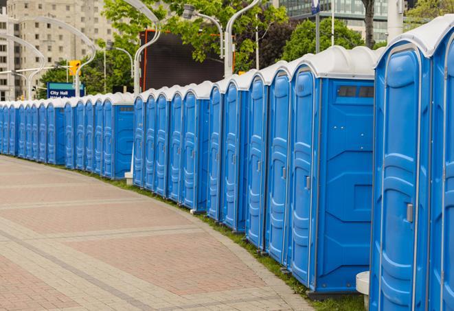 hygienic portable restrooms lined up at a beach party, ensuring guests have access to the necessary facilities while enjoying the sun and sand in Garwood NJ